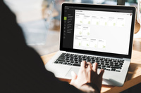 Software DEXIOS Ansicht Launchpad mit Menü auf Laptopbildschirm